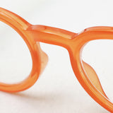 Hub Arrouch Tenga un vistazo a Reading Glass Circle Twist Orange Blue