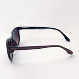 Hub Arrouch看起来有一个太阳镜City Coty Coty Coty