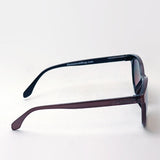 Hub Arrouch看起来有一个太阳镜City Coty Coty Coty